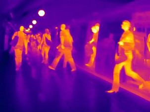 passengers exiting London tube train in thermal imagery