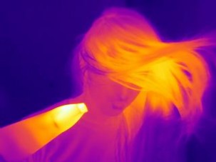 Thermal photograph of a woman in iron colours