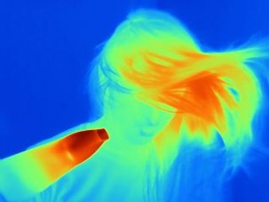 Thermal photograph of a woman in red-blue colours