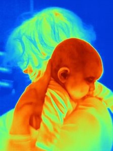 red-blue thermal photo of breastfeeding
